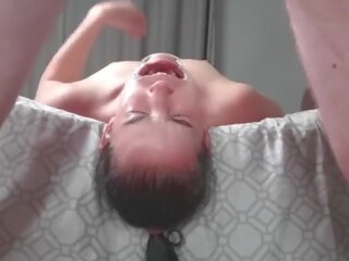 Upside down piss loving fancy woman laying face down from bed swallows piss in two non identical camera angles
